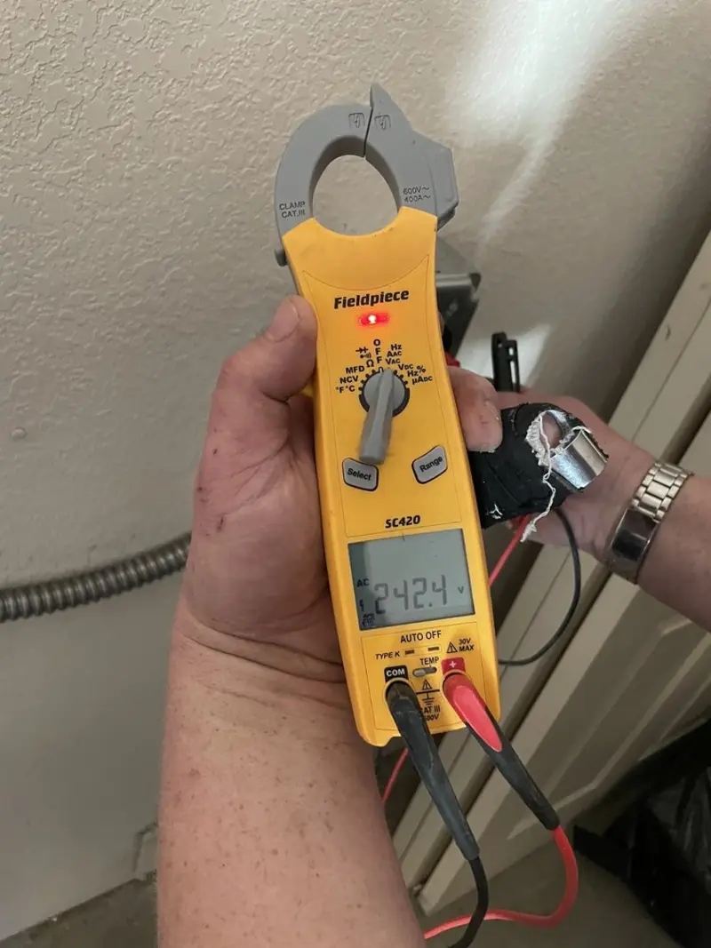 Voltage testing with clamp meter during Generator Installation in South Charleston